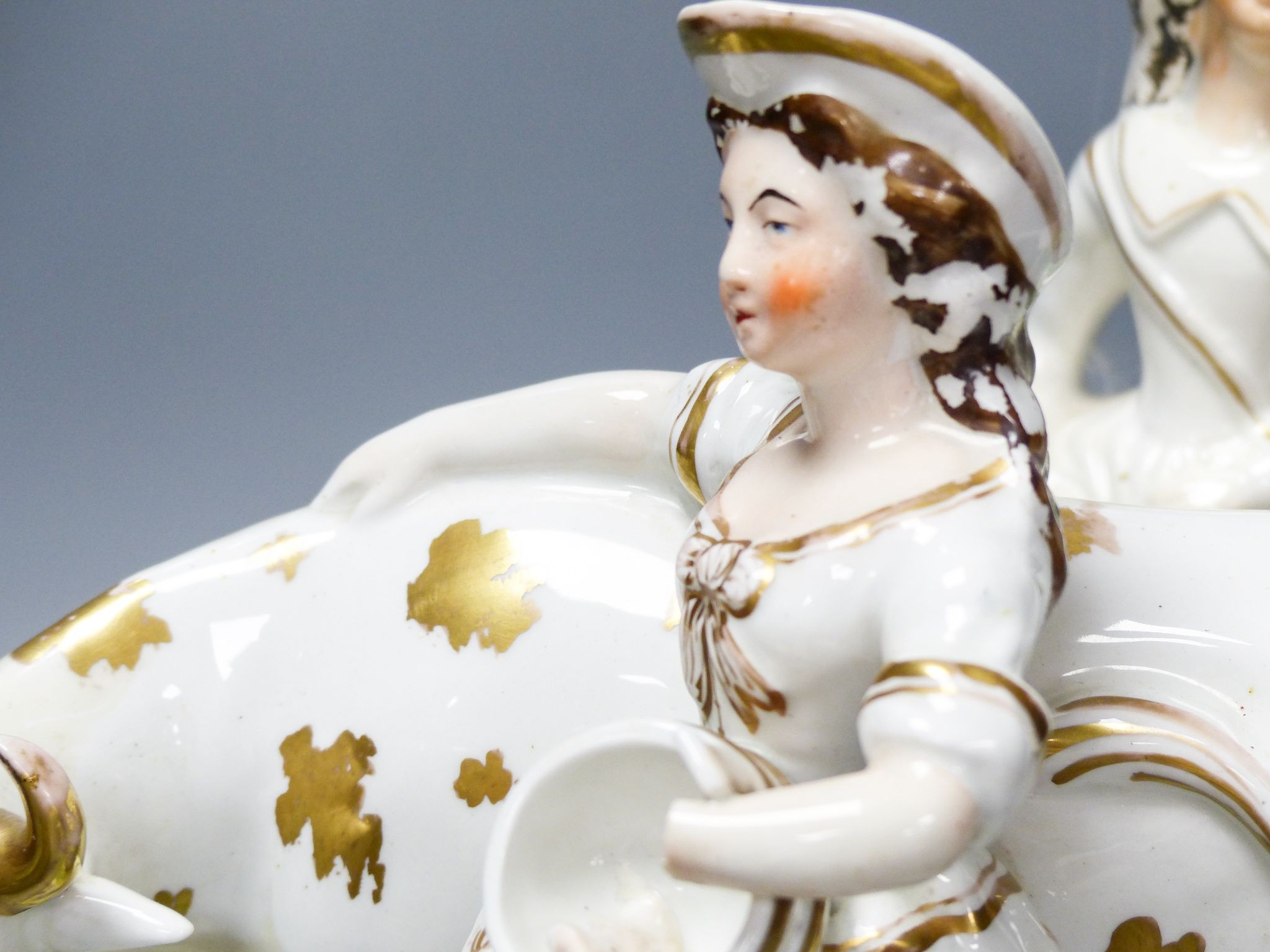 A pair of 19th century Staffordshire cow groups and a similar flatback, tallest 33 cm